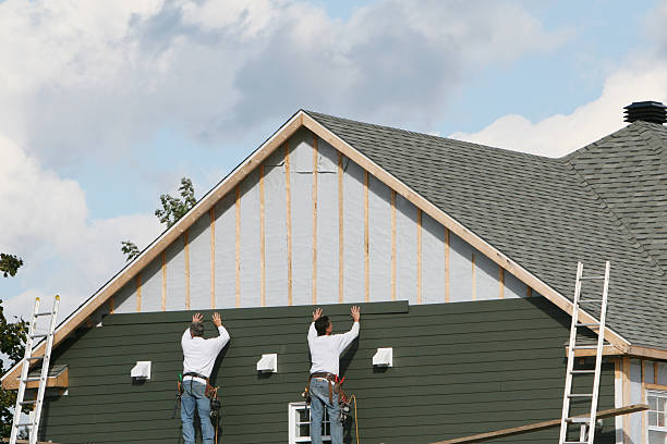 Professional Siding Contractor technician working in Hampstead, MD